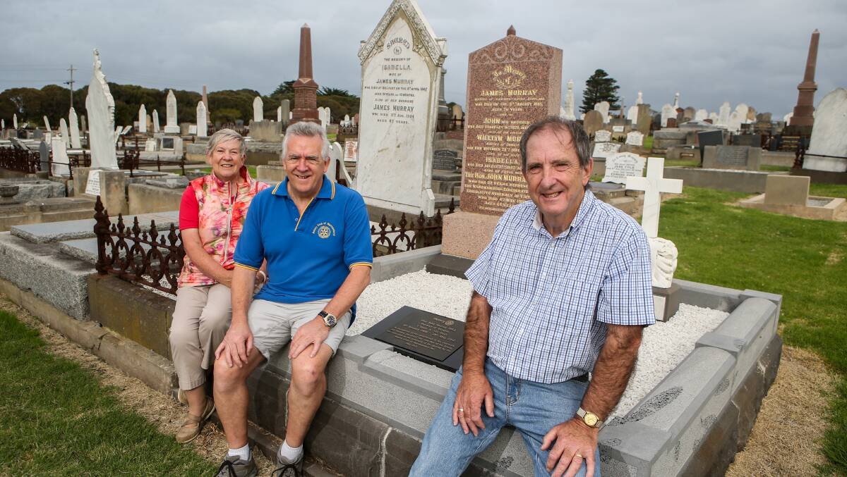 Complete: Rotary Club of Warrnambool's Anne Adams, Terry O'Neill and Brian Trenery with the restored memorial. Picture: Amy Paton