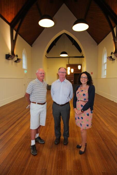 Renewed: Barry Wolff, John Fitizgerald and Donna Monaghan inside the restored 1856 former church. Pictures: Morgan Hancock