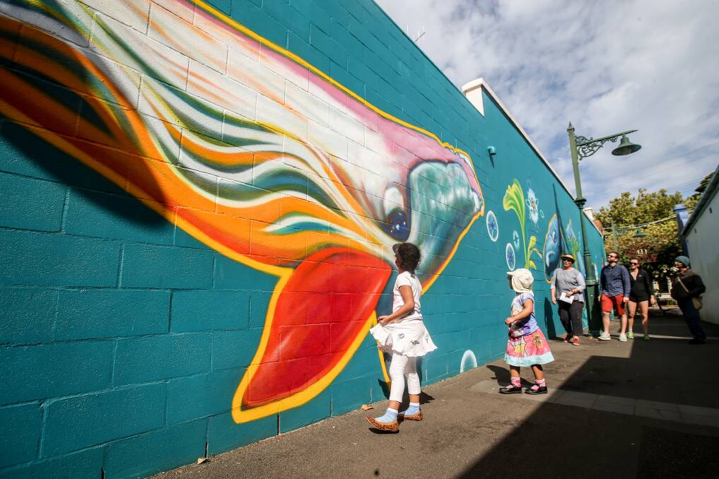 ARTY AND ACTIVE: Warrnambool residents and curious visitors took part in a guided street art walk yesterday to kick off Active Autumn. Picture: Amy Paton