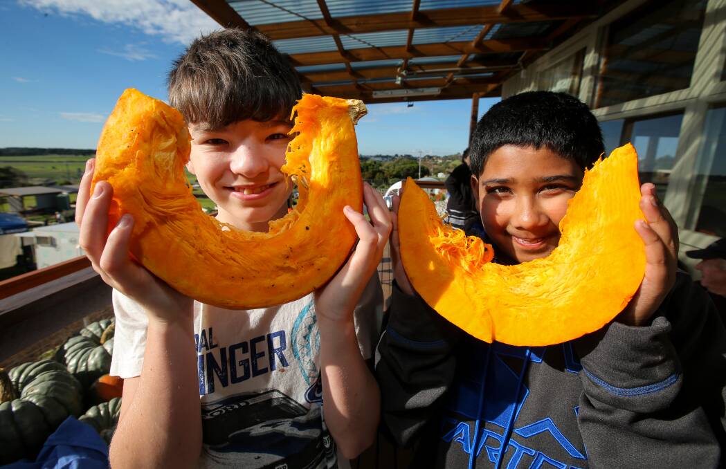 WEALTHY GRIN: Devon Hayduk, 13, and Missaka Henakaralalage, 12, were all smiles at the Pumpkin Festival on Sunday. Picture: Rob Gunstone