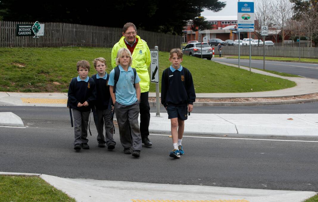 Safety: St Joseph's Primary School principal Michael Gray is raising awareness of crossing concerns with students Trae, Cale, Nate and Kye Brereton Picture: Rob Gunstone
