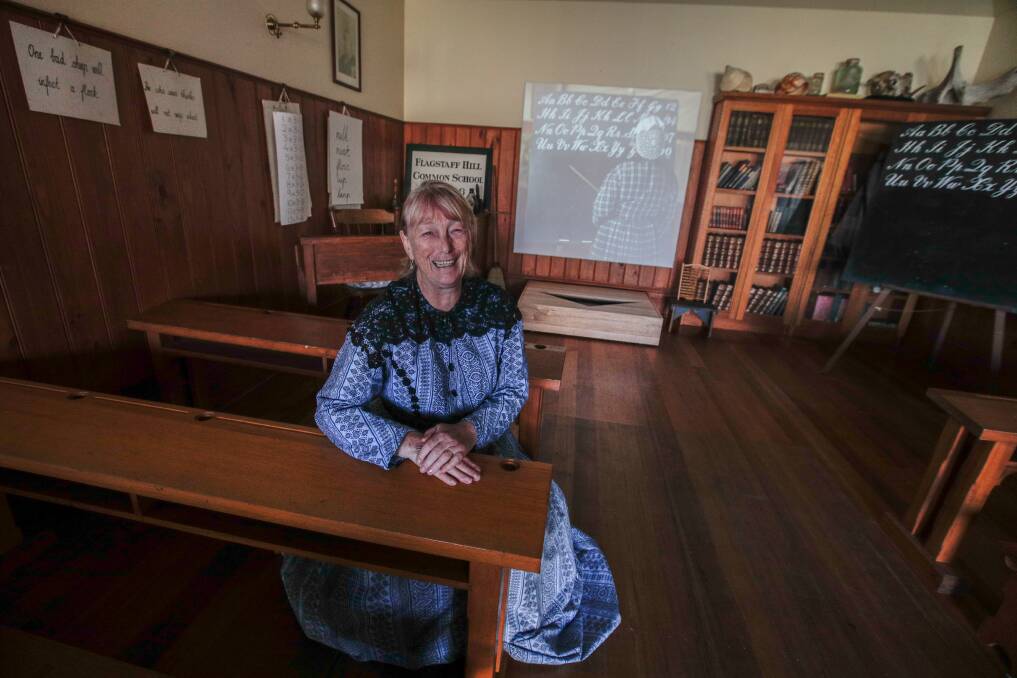 BACK TO SCHOOL, WITH A DIGITAL ELEMENT: Flagstaff Hill Maritime Village volunteer Pat Zaunbrecher in the school house with one of six new interactive screens. Picture: Amy Paton 