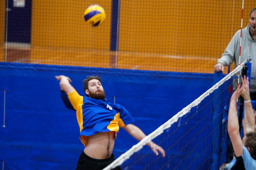 Warrnambool Volleyball Association player Ethan Brown swings hard at the ball. Picture: Rob Gunstone