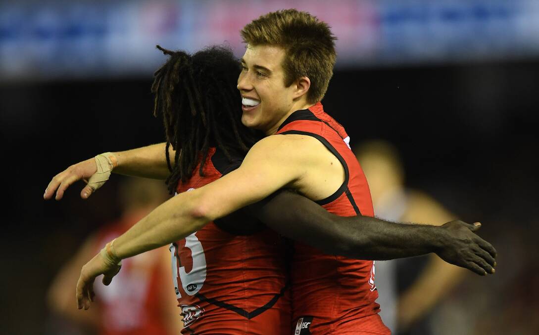 HOME SWEET HOME: Cobden export Zach Merrett (right) will visit Port Campbell with his Essendon teammates on Monday as part of an AFL Community Camp. Picture: AAP