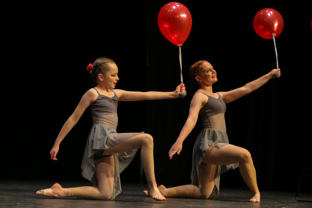 Red Balloons: Greta Pinninger and Holly Allgood, from Ararat, compete in the Lyrical Duo/Trio competition. Picture: Rob Gunstone