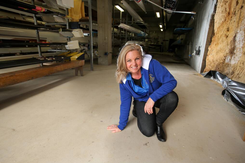SOLID GROUND: City of Warrnambool Rowing Club president Jo Bone shows off the raised floor in the clubrooms. Picture: Rob Gunstone