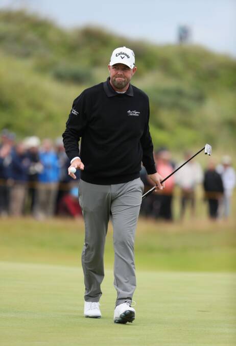DAY TWO: Warrnambool export Marc Leishman waves to the crowd on the 8th green during the second round of the 146th Open Championship at Royal Birkdale on July 21, 2017 in Southport, England. Picture: Getty Images