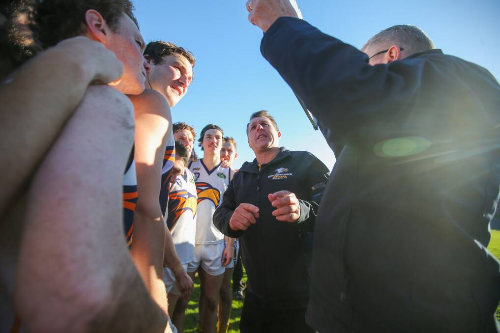 LEADER: North Warrnambool Eagles co-coach Graeme Twaddle speaking to players at three-quarter-time. Picture: Morgan Hancock