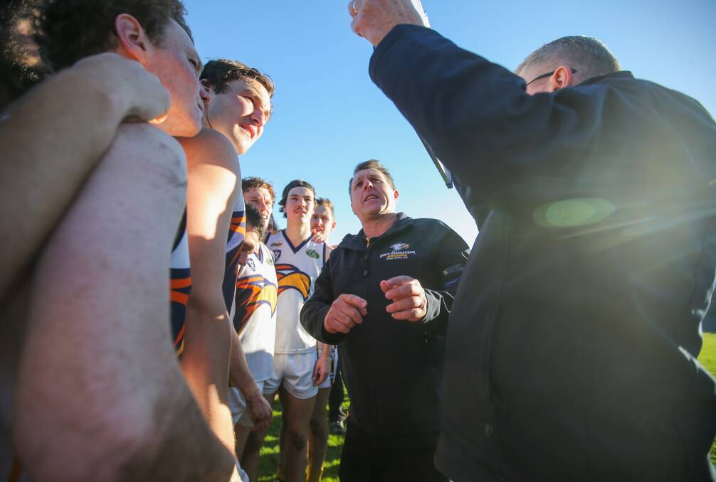 RALLYING THE TROOPS: North Warrnambool Eagles leader Graeme Twaddle (centre) will take on the coaching role solo at the Eagles next season. Picture: Morgan Hancock