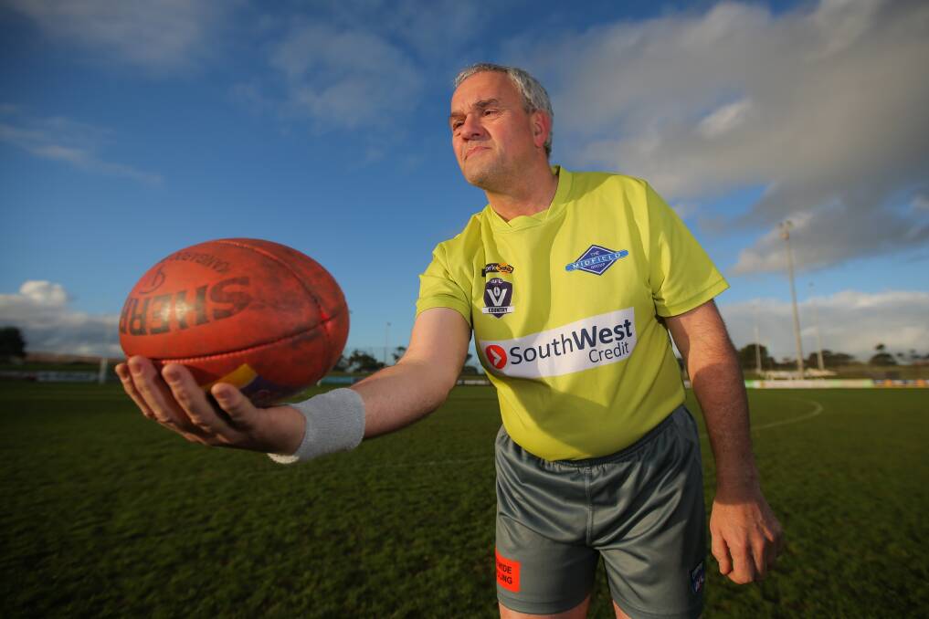 FAMILY TIES: Warrnambool's Greg Lemmens will umpire with his son Ben as part of his 600th game celebrations. Picture: Morgan Hancock