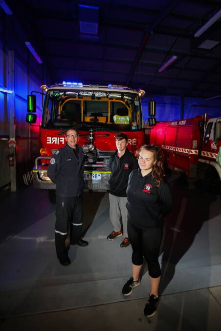 Senior station officer Greg Kinross alongside new volunteers Ryan Prout and Caitlin McConnell. Picture: Morgan Hancock
