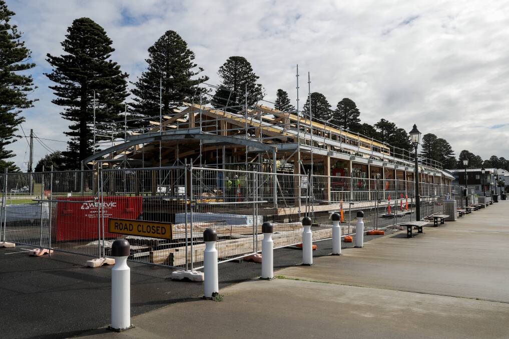 DELAYS: Work is continuing on the development at the wharf on the Moyne River in Port Fairy but the finish date has been pushed back by three months. Picture: Rob Gunstone