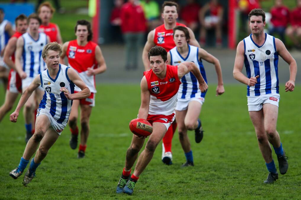 TAG, YOU'RE IT: South Warrnambool's Paddy Anderson is learning to deal with added opposition pressure. Pictures: Morgan Hancock, Rob Gunstone