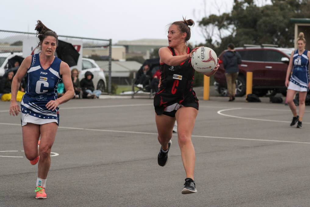 Warrnambool centre Sarah O'Keeffe can't stop the run of Cobden centre Helene Myers. Picture: Rob Gunstone