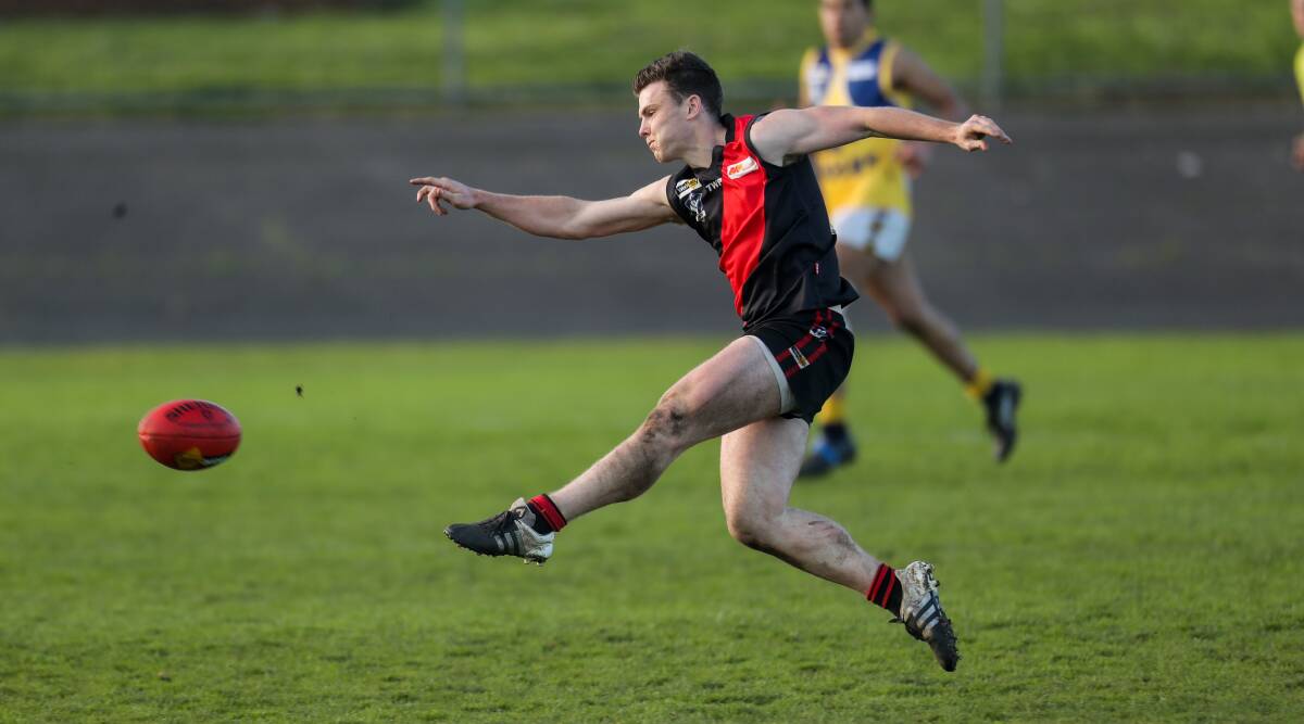 BIG BOOST:  Cobden's Angus Uwland last season. The Bombers' practice game against St Albans will be a bushfire fundraiser.