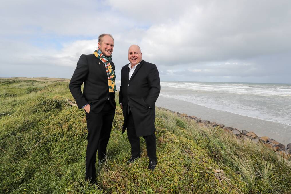 Moyne Shire deputy mayor Jordan Lockett with State Treasurer Tim Pallas, talking about the state of the old Port Fairy tip site along East Beach. Picture: Rob Gunstone