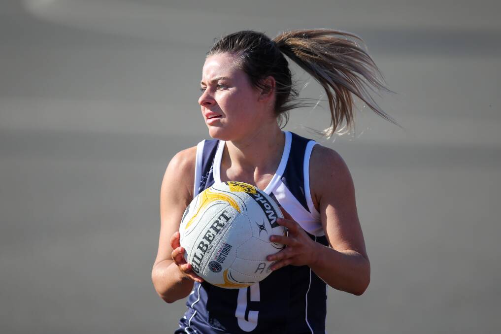 STRONG EFFORT: Nirranda's Kristy Ludeman looks for team members to pass to. She was among the Blues' best in Saturday's grand final loss. Picture: Morgan Hancock