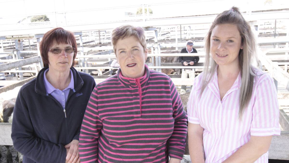 In the mix: At the sale were Carolyne Rylance, of Timboon, Joyce McKenzie of Terang, who bought calves for $450 each, and Sophie Healey of Ecklin South.