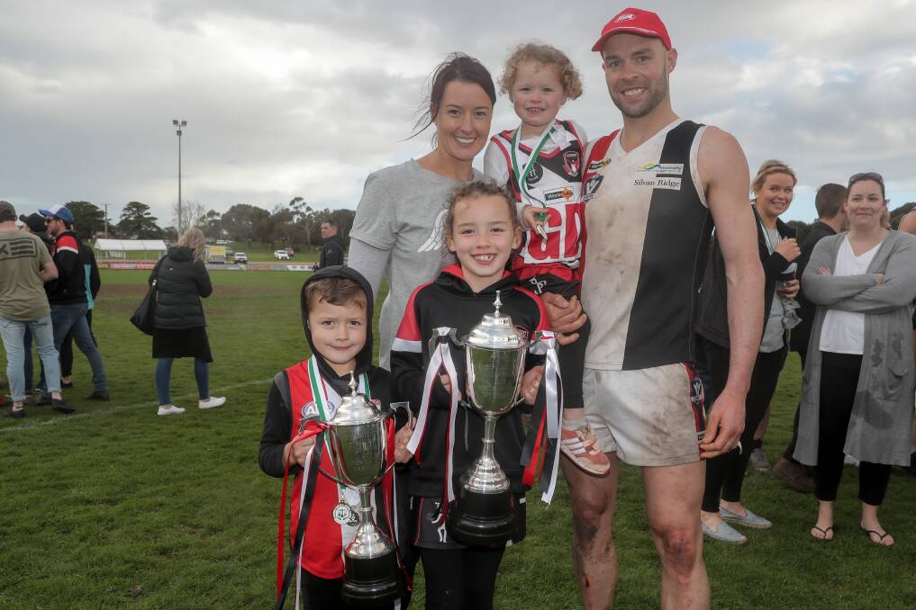 FAMILY AFFAIR: Premiership family, Koroit netball player Jess O'Connor and football player Damian O'Connor, with their kids Billy, 5, Remi, 3, and Indi, 7, after they both won their grand finals. Picture: Rob Gunstone