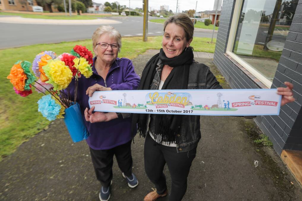 Town buzzing: Denise Robertson and Leanne McQuinn get Cobden ready for the annual spring festival this weekend, which will feature plenty of old favourites and new additions. Picture: Morgan Hancock