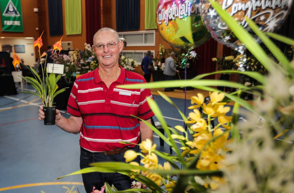 Tom Spillman pictured with his winning plant at the Warrnambool and District Orchid Society which was held over the weekend. Picture: Morgan Hancock
