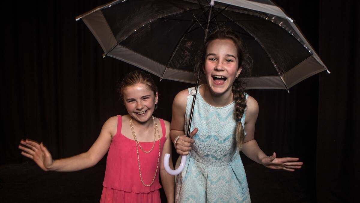 What a glorious feelin': King's College pupils Livinia Benfell and Taz Reuel rehearse for their roles in Singin' in the Rain, which will hit the school's stage later this month.