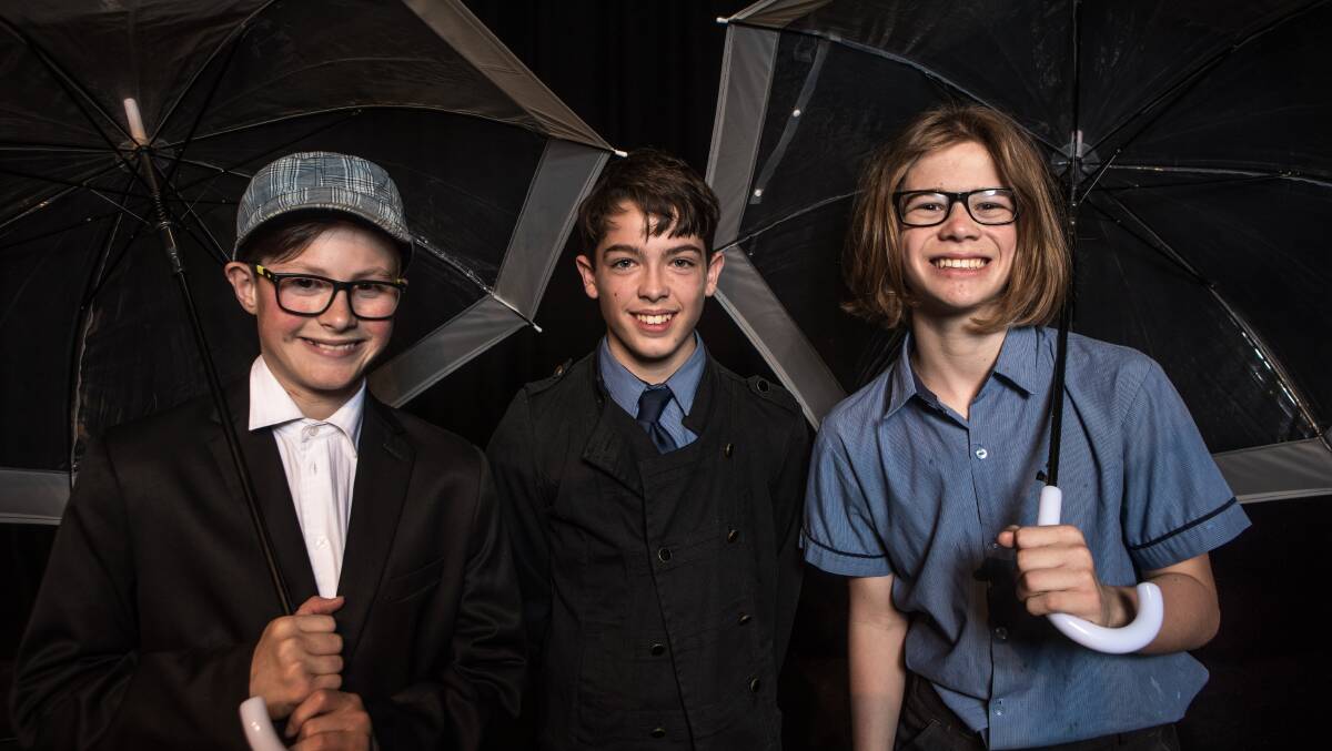 On stage: King's College pupils Ethan Greene, Isaac Draffen and Jack Purcell are preparing for their production of Singin' in the Rain. Pictures: Christine Ansorge