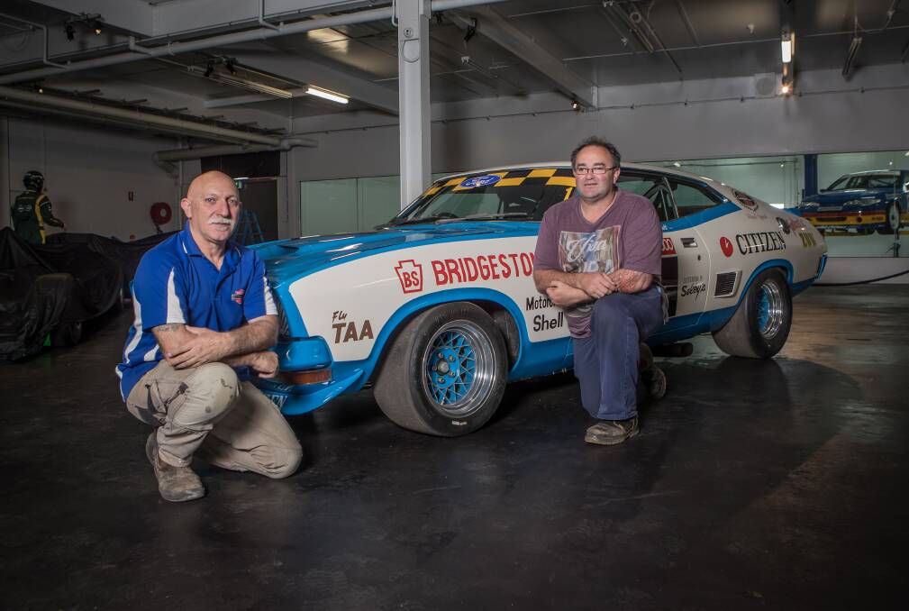 SWEET RIDE: Mick Katsaros and Troy Kelly in front of the XB Falcon coupe which will be on display this weekend. Picture: Christine Ansorge