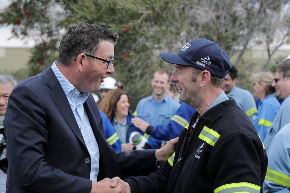 Well done: Premier Daniel Andrews chats with Alcoa Portland's metals manager Ron Jorgensen about his new role. Picture: Rob Gunstone