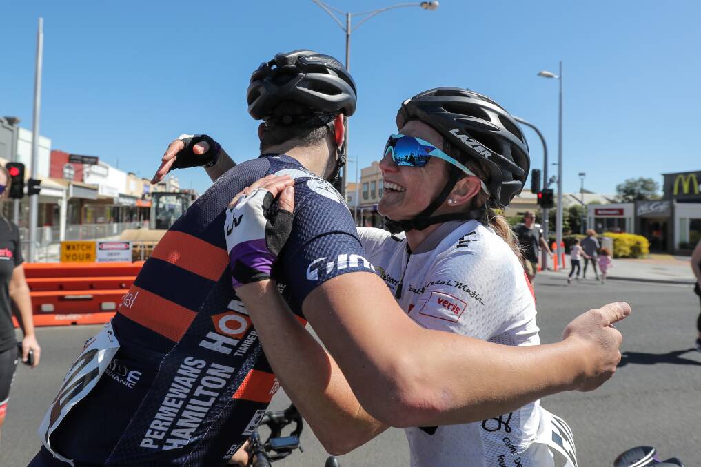 CONGRATULATIONS: First female rider home in the Melbourne to Warrnambool Erin Nolan gets a hug from Warrnambool rider Sam Lane. Picture: Rob Gunstone