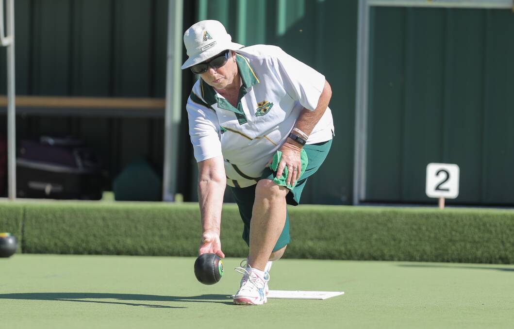 IN FORM: Lawn Tennis' Doreen Prout releases the bowl. Picture: Morgan Hancock