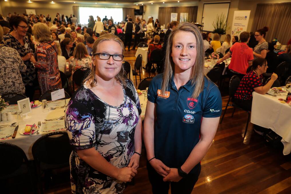Well Balanced: WestVic Dairy Young Dairy Network coordinator Heidi Van Es with Melbourne Football Club player and dairy farmer Shelly Scott. Picture: Rob Gunstone