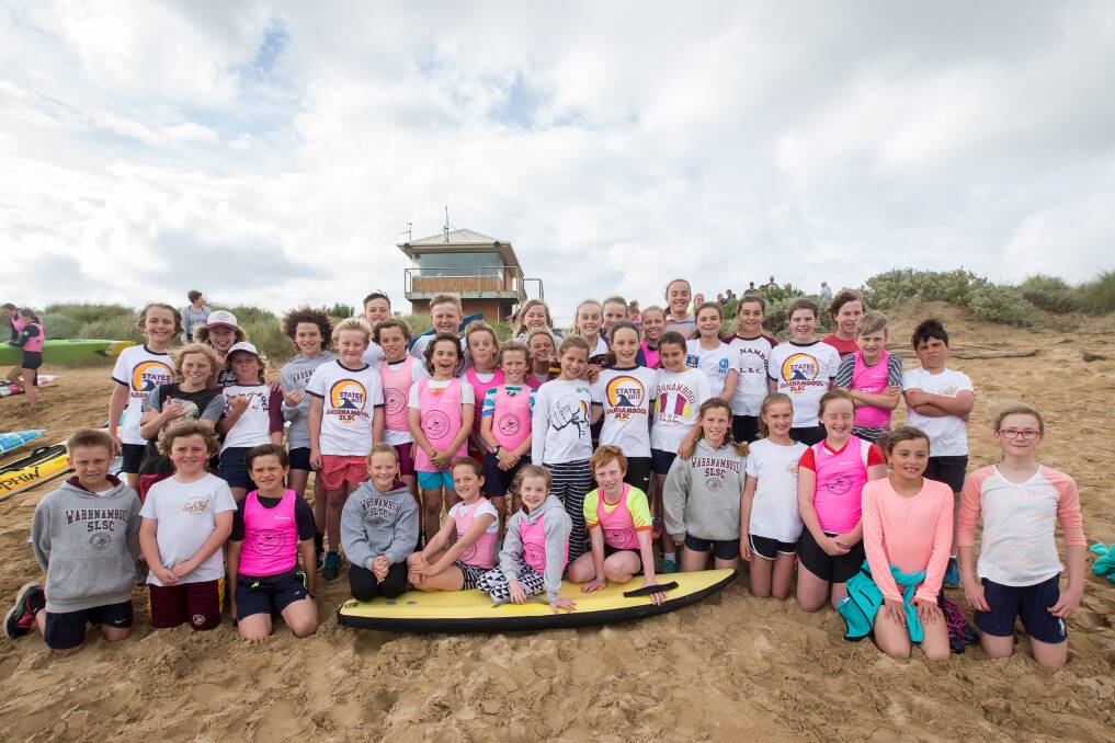 SURF'S UP: Warrnambool Surf Lifesaving Club's 50-strong squad training group is happy summer is just around the corner. Picture: Christine Ansorge