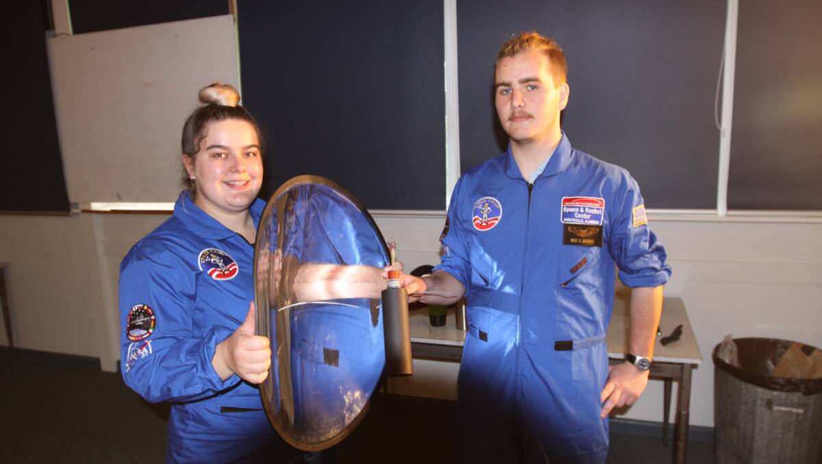 Way out: Timboon P-12 School students Sasha Weston and Adam Beaton with their experiment to harvest water to grow food on Mars for the school's TAP's On expo.