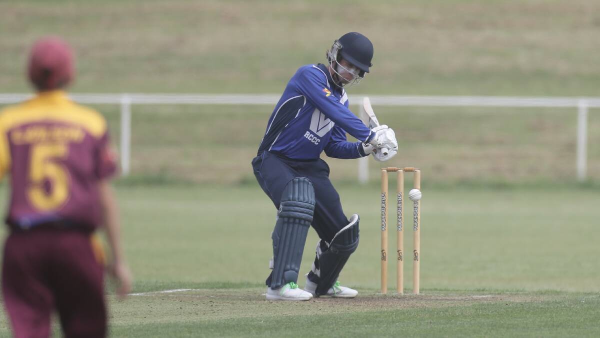 Russells Creek captain Cam Williams watches the ball onto his bat. Picture: Nick Ansell