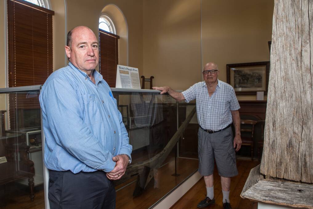 Glenelg Shire councillor Gilbert Wilson and Graeme Firth in History House in front of Henty's Plough.  Picture: Christine Ansorge