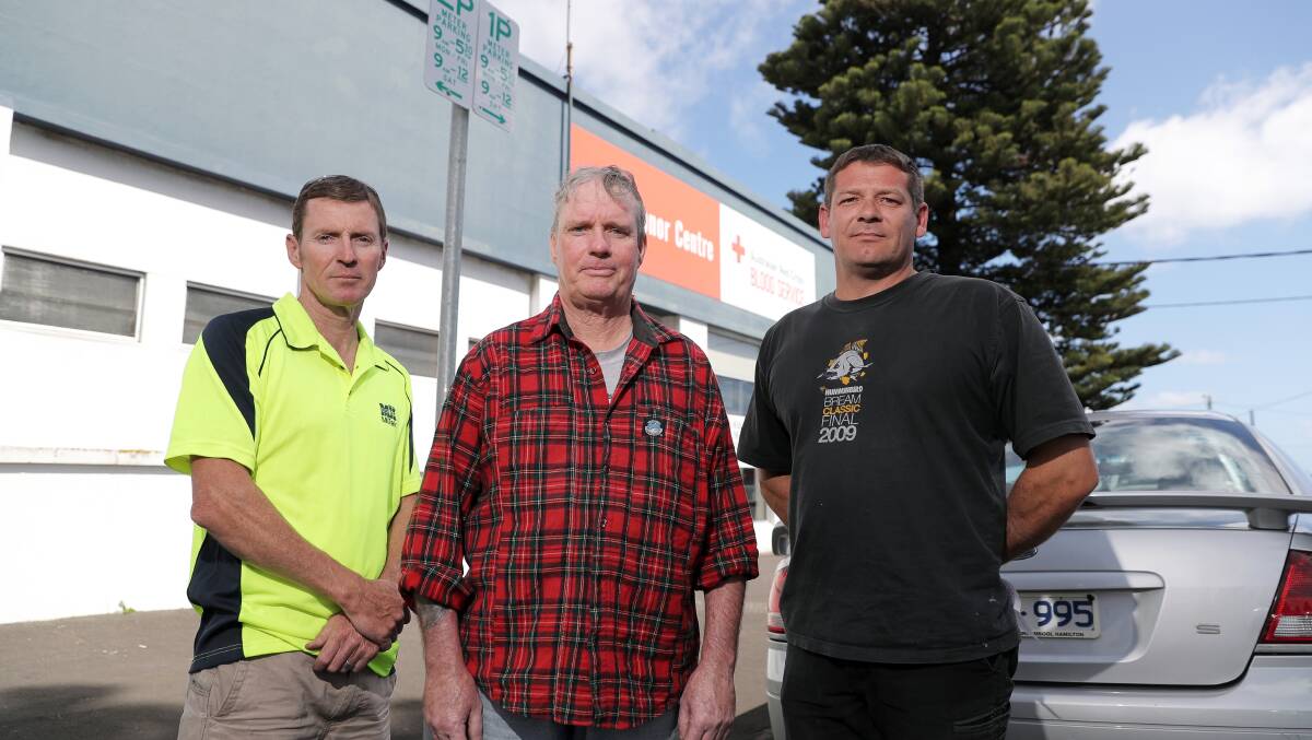 Annoyed: Blood and plasma donors Damian Chisholm, Warrnambool, John Smith, Port Fairy, and Rod Stephens, Warrnambool, are unhappy about the parking fees introduced outside of the Warrnambool Donor Centre. Picture: Rob Gunstone