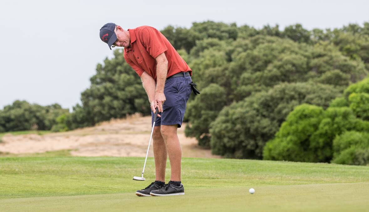 MARATHON: Warrnambool golfer Chris van der Starre lines up a putt on Monday during the Longest Day Challenge, raising money for cancer research along the way. Picture: Christine Ansorge