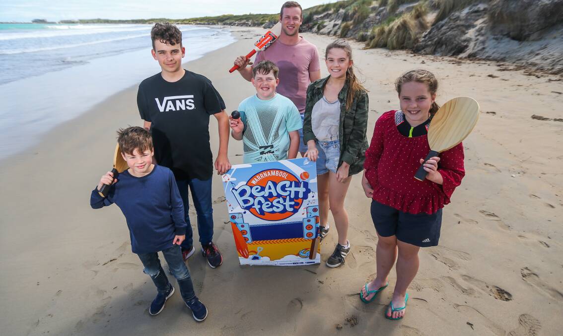 Bowled over: Warrnambool's Luke Farley, 7, Rex Tippett, 13, Bill Sheedy, 10, Jack Whitehead, Beth Tippett, 15 and Kate Sheedy, 12 are ready for a good innings of beach cricket as part of Beachfest. Picture: Morgan Hancock