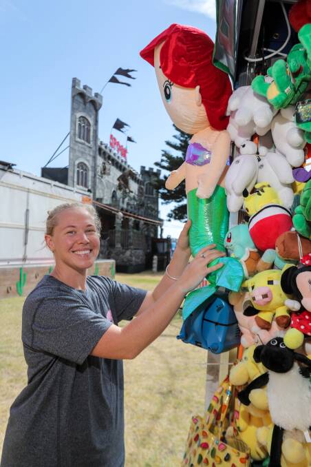 Final touches: Codie Miller said her and other amusement ride operators were ready for the seaside carnival's Boxing Day launch. Picture: Rob Gunstone.