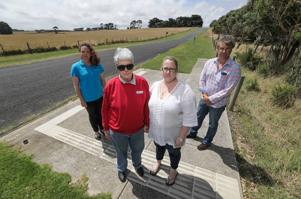 FIX IT: Jubilee Park Big 4 manager Catherine Hein, resident Jean Graham with her daughter Karen Chislett, and Warrnambool City councillor Tony Herbert on the old bus stop pad located neat the caravan park. Picture: Rob Gunstone