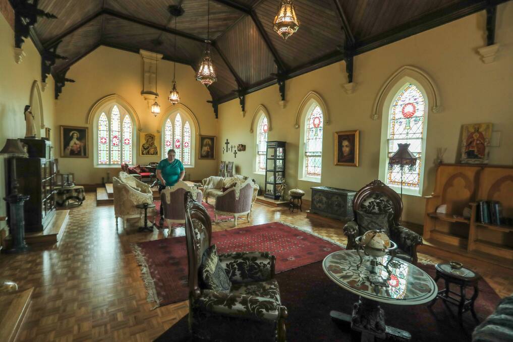 NEAT: Cleaner Shaunie O'Connor at work in the old chapel at the Saint Patrick's Luxury Boutique Hotel in Koroit. 