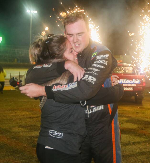 JOY: Corey McCullagh is congratulated by his girlfriend after winning the South West Conveyancing Grand Annual Sprintcar Classic. Picture: Morgan Hancock