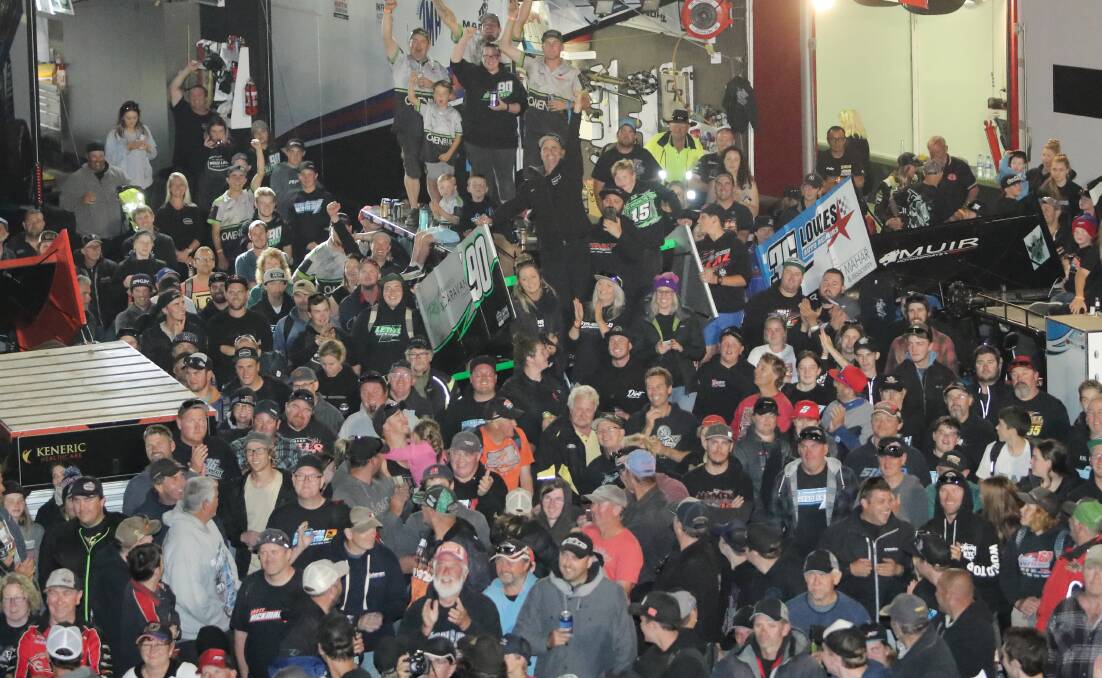 HAPPY: Corey McCullagh's supporters celebrate his win in the Grand Annual Sprintcar Classic. Picture: Morgan Hancock
