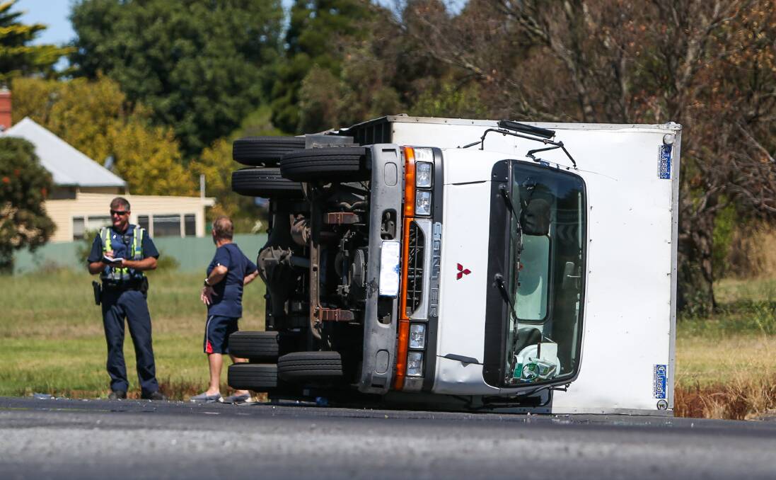 LUCKY ESCAPE: Police responded to a truck rollover on the Princes Highway, at Gnotuk. Picture: Morgan Hancock