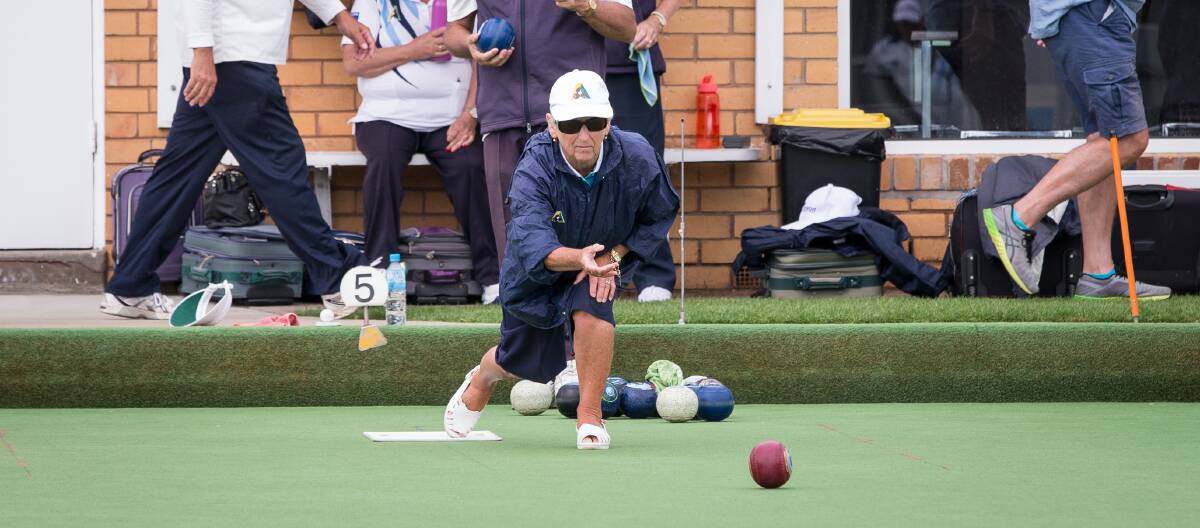BALANCED: Port Fairy Gold's Patty Murray watches the line of her bowl. Picture: Christine Ansorge