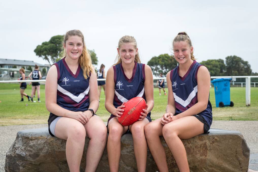 KICKING GOALS: Emmanuel College's Anneliese Boschen, 14, Mali Baillie, 14, and Catie Ragg, 13, are in its football academy. Picture: Christine Ansorge
