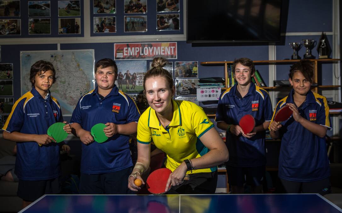 GIVING BACK: Commonweath Games-bound Melissa Tapper visited Warrnambool College's Clontarf Academy students including Michael Chivers (left), Isaac Dalton, Joel Campbell and Jirra Clarke. Picture: Christine Ansorge