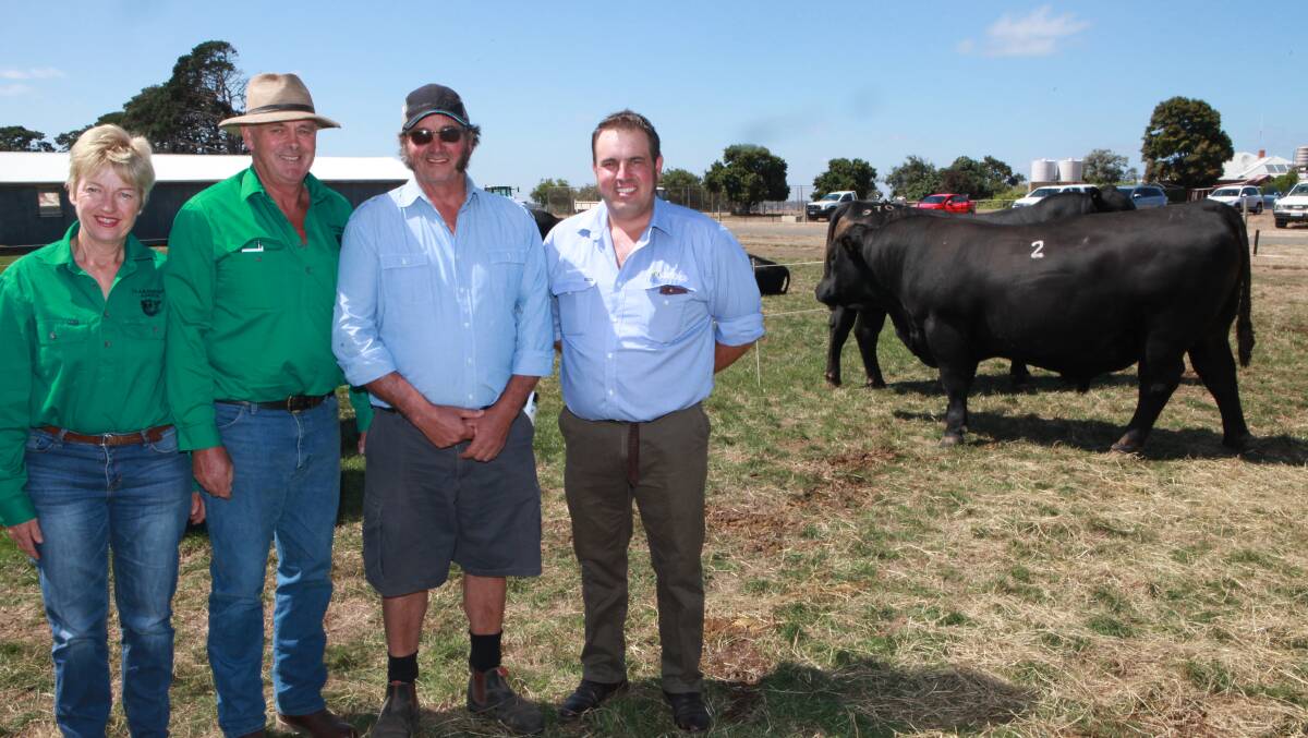 Bull sale: Claremont Angus principals Liz and Graeme Glasgow with the $6000 top priced bull buyer Rick Horspole of Leslie Manor near Camperdown and stock agent Clayton Horspole from Charles Stewart Nash McVilly. 