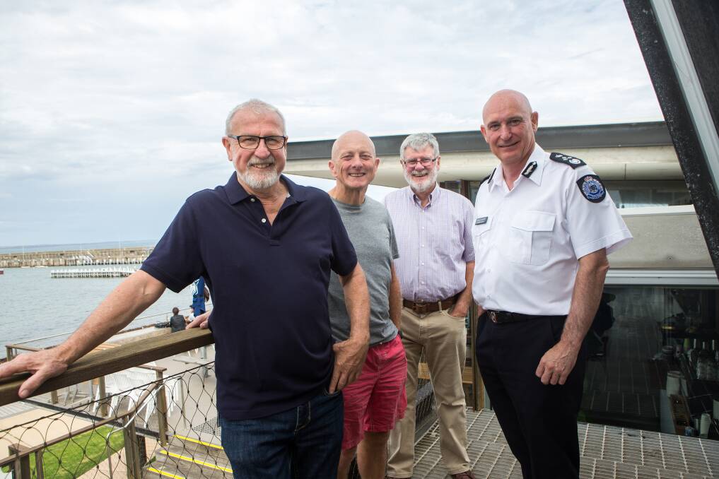 VISIT: Warrnambool Coast Guard's Allan Wood, Keith Prest, Geoff Spencer and Victorian emergency services commissioner Craig Lapsley. Picture: Christine Ansorge